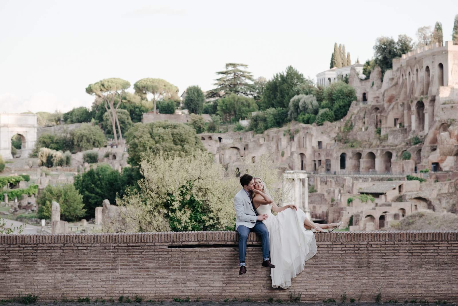 A couple sitting above the Imperial Forum