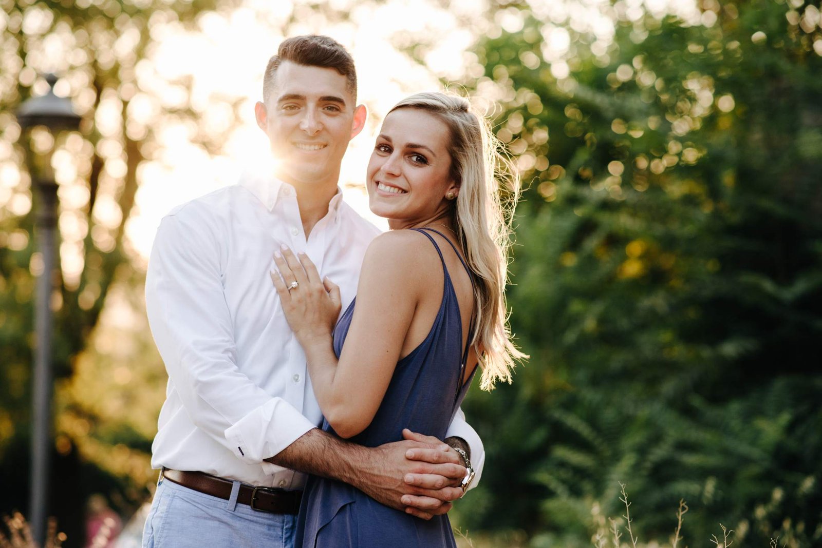 A couple embracing after the proposal