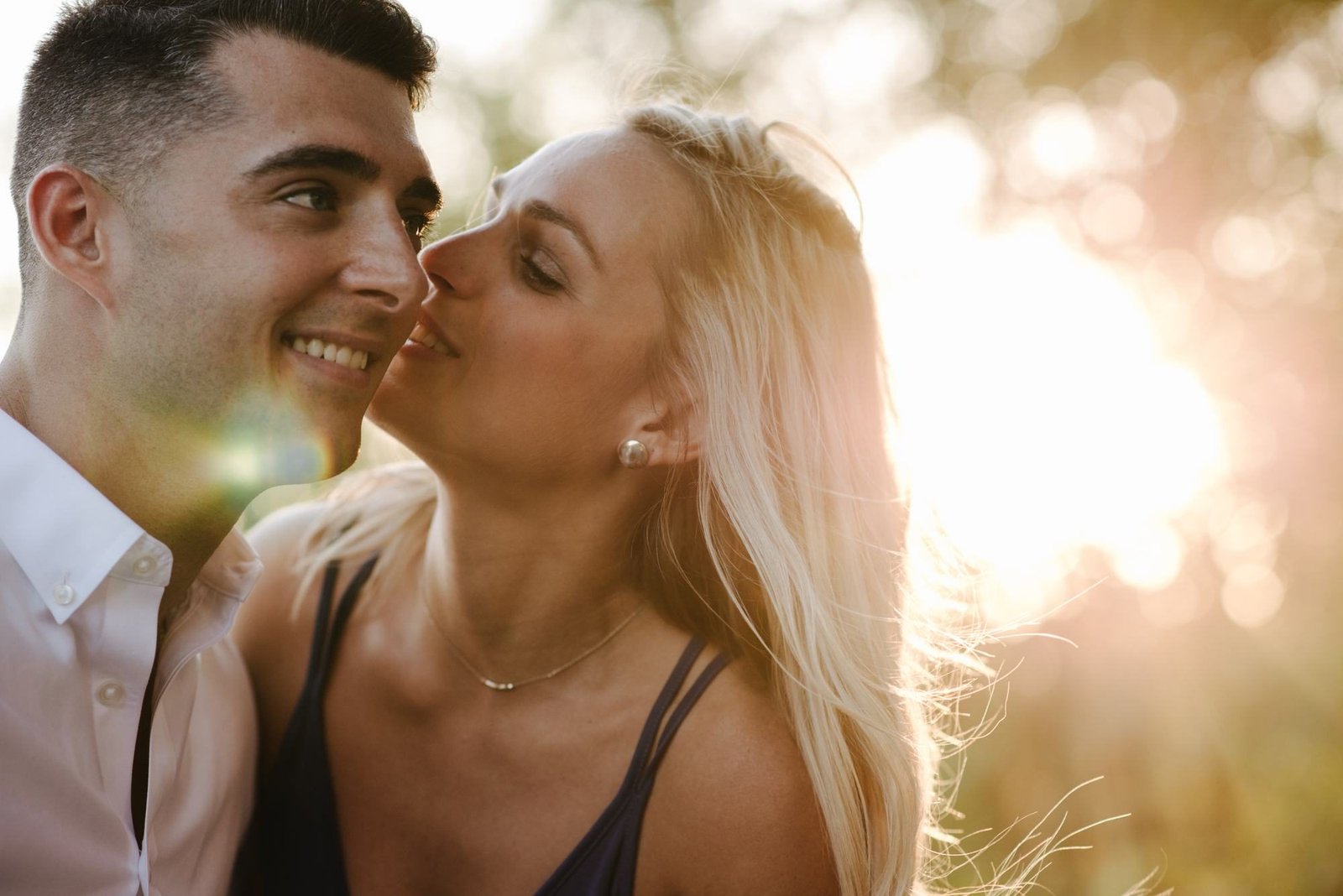 A kiss on the cheek in the evening light