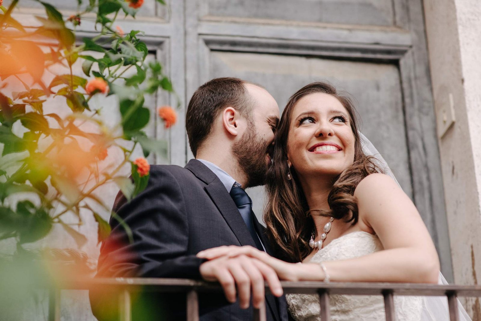 A couple laughing among the flowers in Trastevere