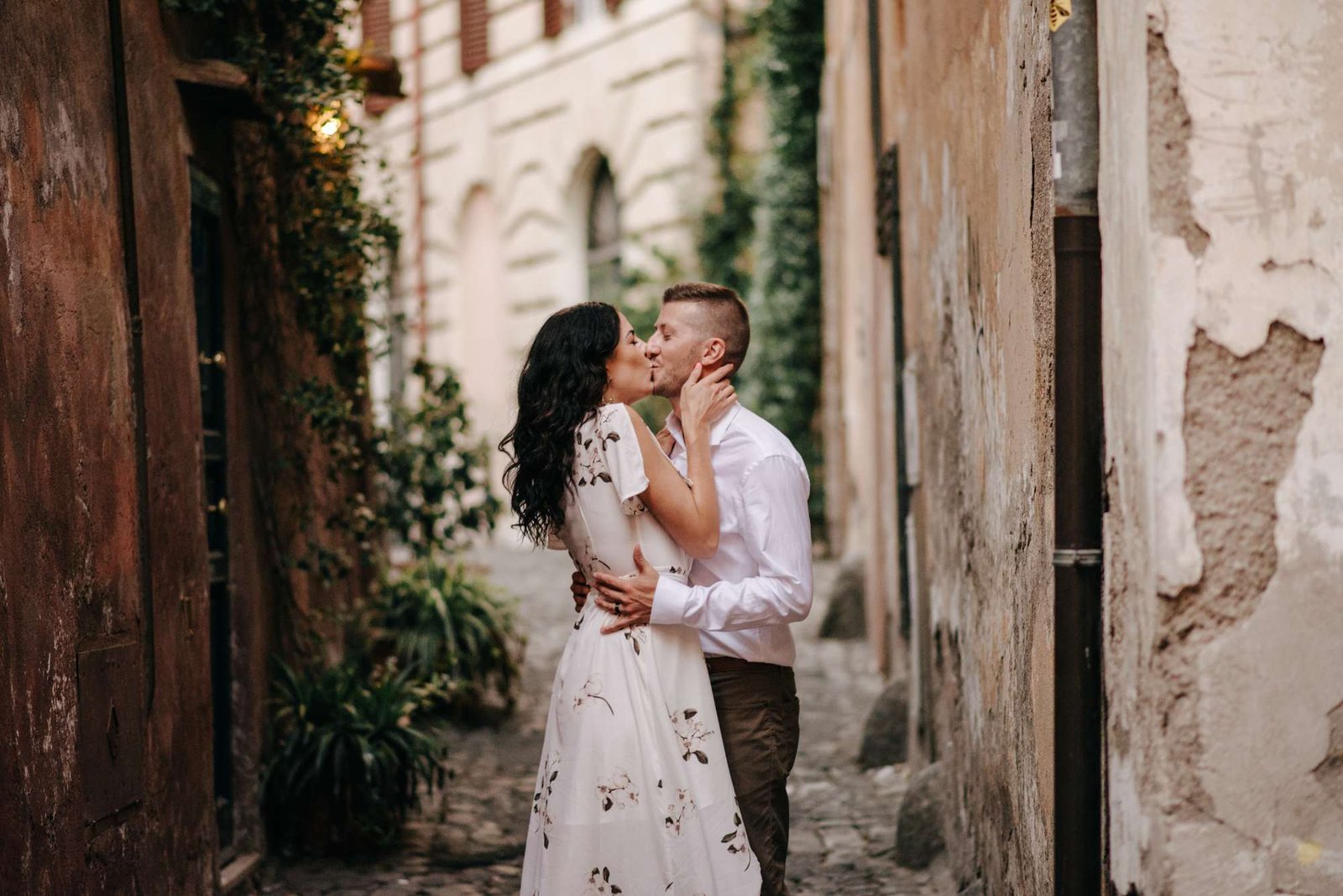 A couple close together in a Trastevere side street